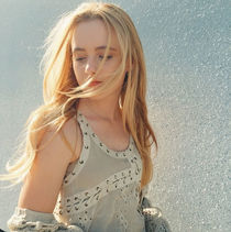 Blonde teen with pigtails